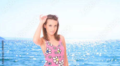 Beautiful young woman relaxing by the beach © Netfalls