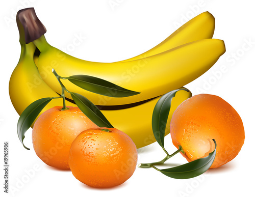 Fresh tangerine fruits with green leaves and banana.