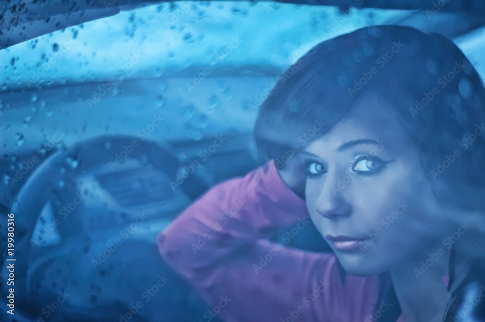 Portrait of woman in window of car Portrait of woman in window of car