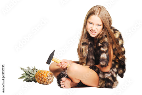 Little girl dressed in furs like prehistoric man