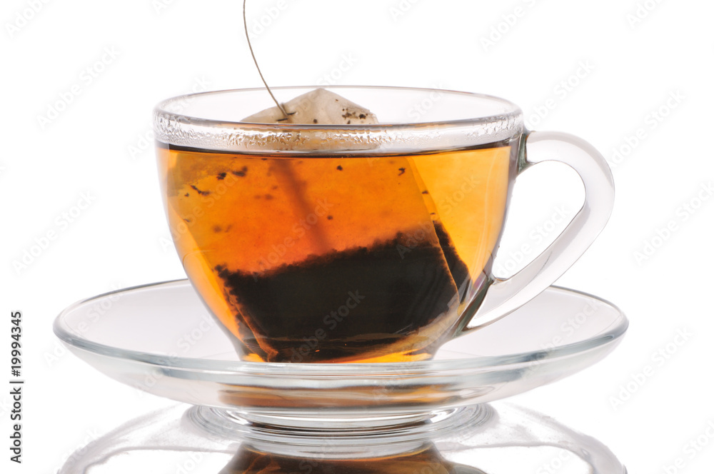 Cup with tea and tea bag on a white background