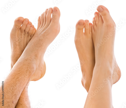 Young couples foot side by side