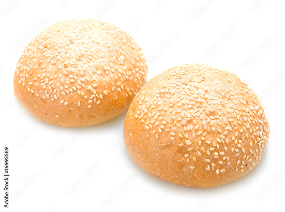 Two tasty baked rolls with sesame isolated Two tasty baked rolls with sesame isolated