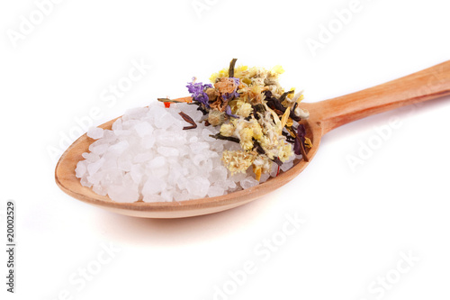 Spoon with sea salt and herbs