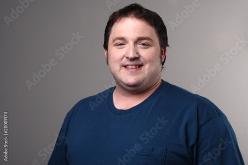 Portrait of a young portly man.