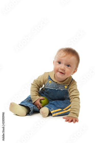 little boy and green apple.