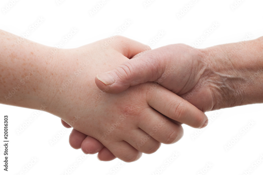 Diversity - young and old females shaking hands Diversity - young and old females shaking hands