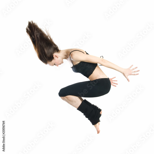jumping young dancer isolated on white background