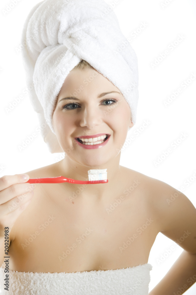 Young beautiful woman with healthy strong teeth and white towel Young beautiful woman with healthy strong teeth and white towel