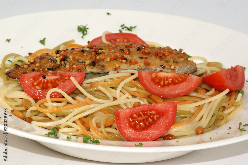 spaghetti with peppered mackerel on a plate