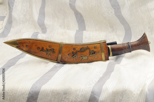 A kukri in its sheath photo