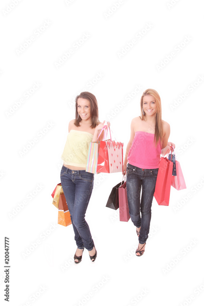 Two happy young beautiful women with the purchases Two happy young beautiful women with the purchases