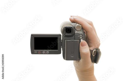 Videocamera in a female hand photo