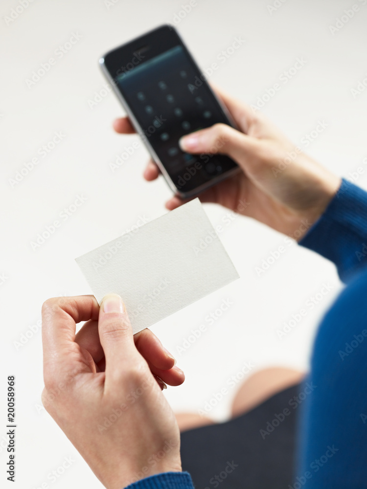 Obraz premium business woman holding business card
