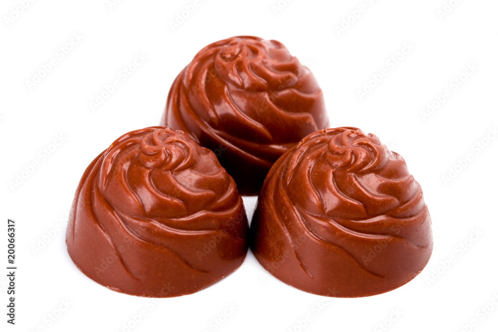 three chocolate sweets three chocolate sweets