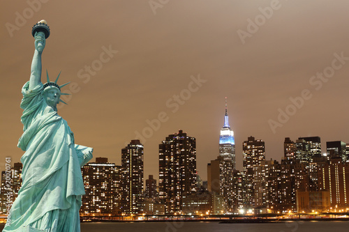 New York City Skyline and The Statue of Liberty at Night © Joshua Haviv