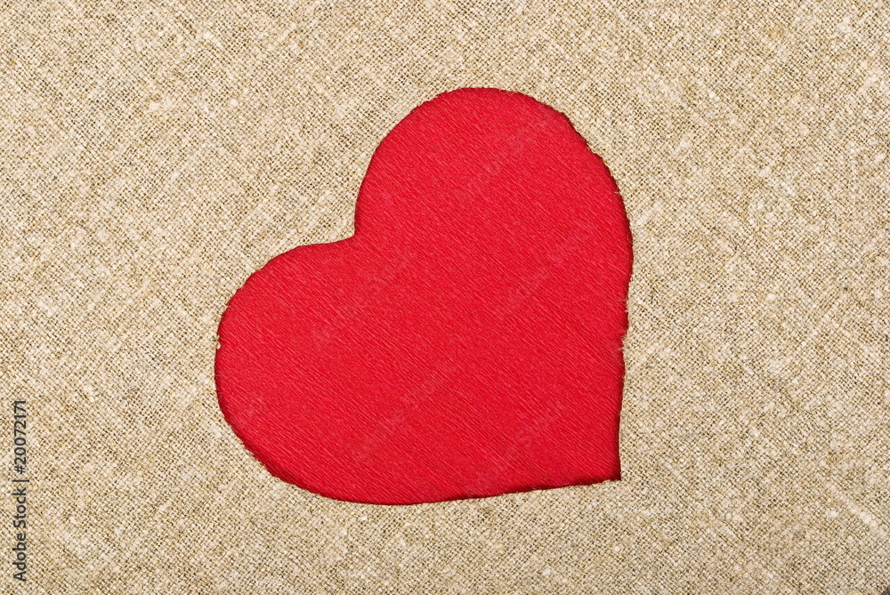 Red heart on sackcloth background Red heart on sackcloth background