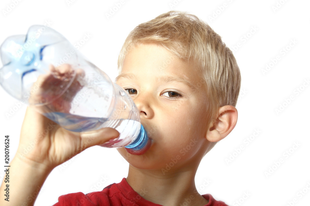 Portrait of the boy drinking water from a bottle. Portrait of the boy drinking water from a bottle.