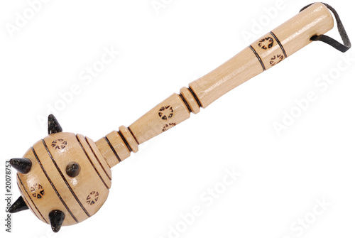 Wooden spiky souvenir mace isolated on white photo
