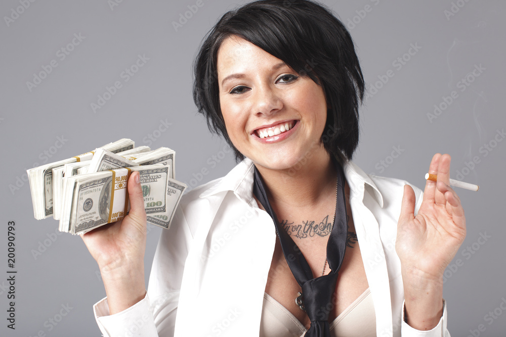 Sexy woman with loose clothing handling lots of cash. Sexy woman with loose clothing handling lots of cash.