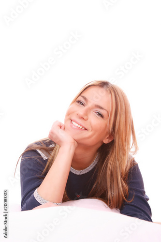 smiling woman on bed at bedroom