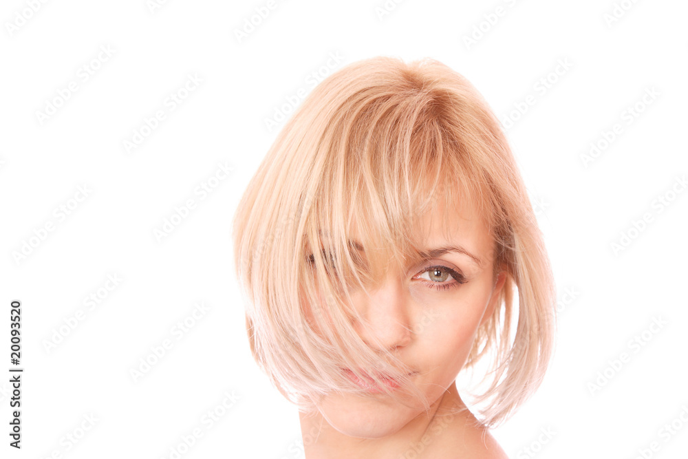 A beautiful young woman with her hair blowing and smiling A beautiful young woman with her hair blowing and smiling