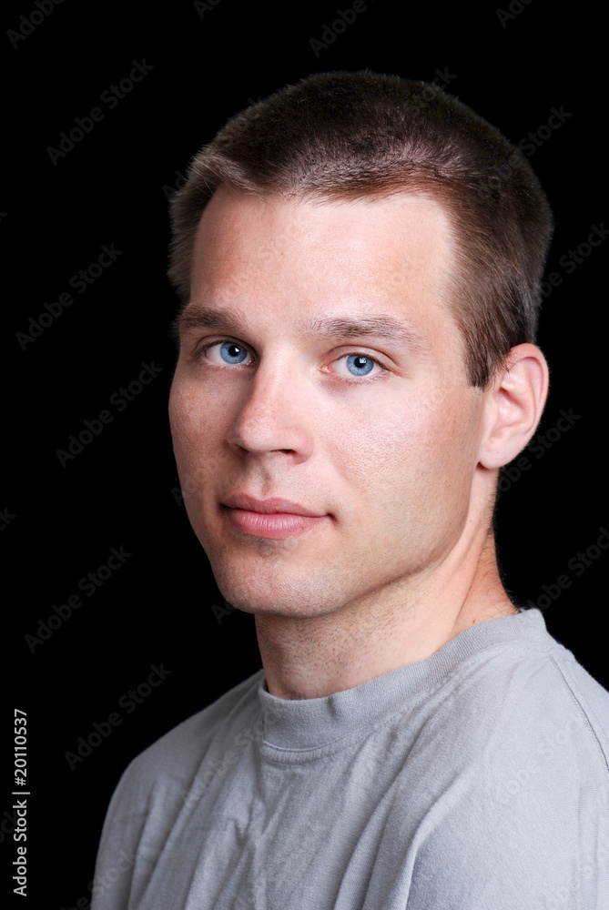 Obraz premium Young Man Wearing Grey T Shirt