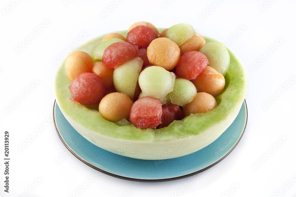Melon balls in honeydew bowl Melon balls in honeydew bowl