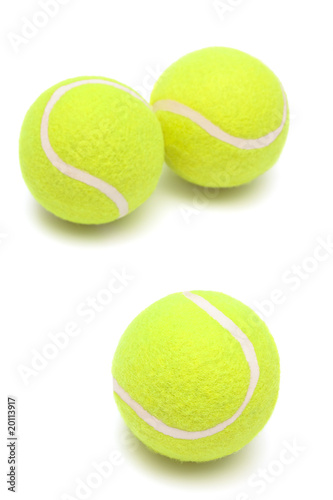 modern tennis balls on a white background © terex