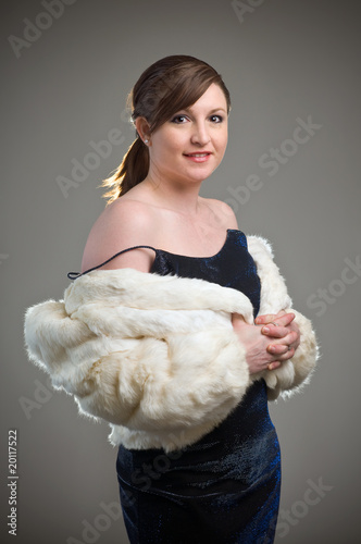 Woman Fashion Model in White Fur Winter Coat