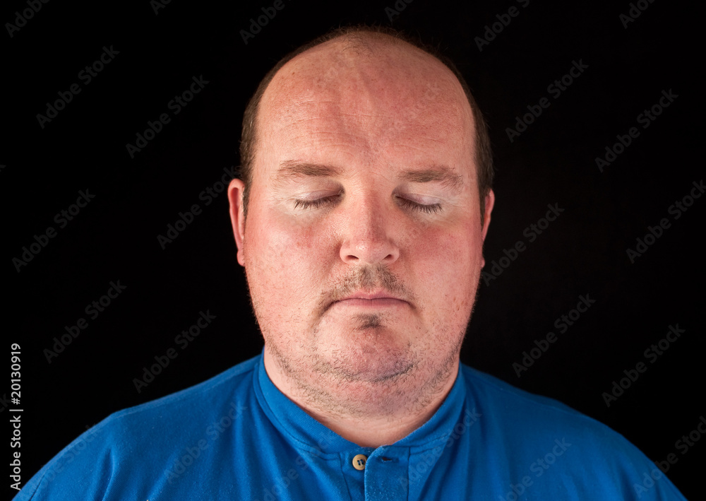 Fototapeta premium closeup portrait capture of a male on black background