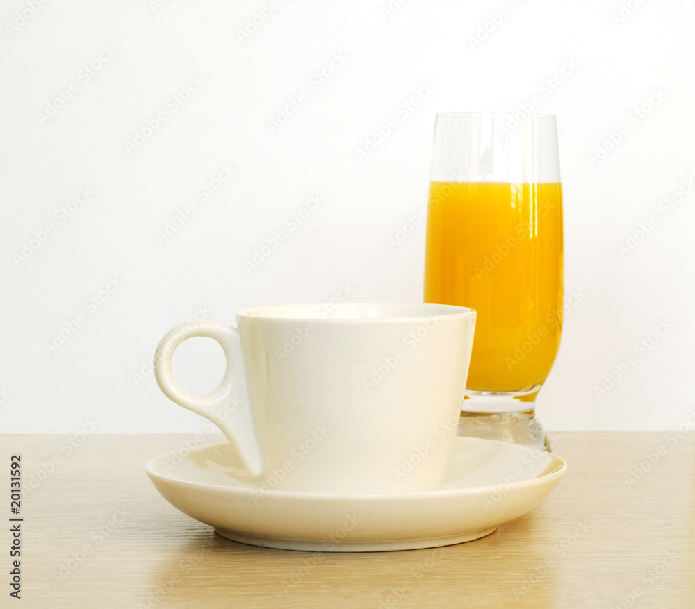 Cup of coffee with glass of juice