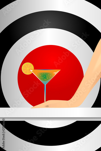 Hand with a martini glass on an abstract background