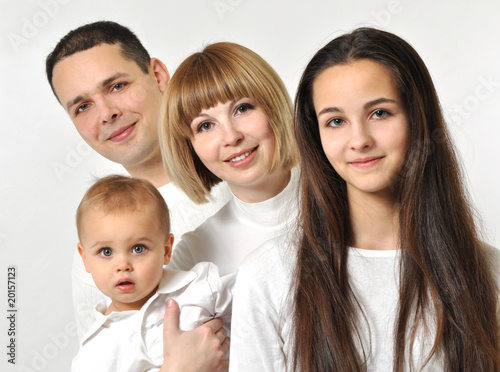 Casual portrait of a happy young family