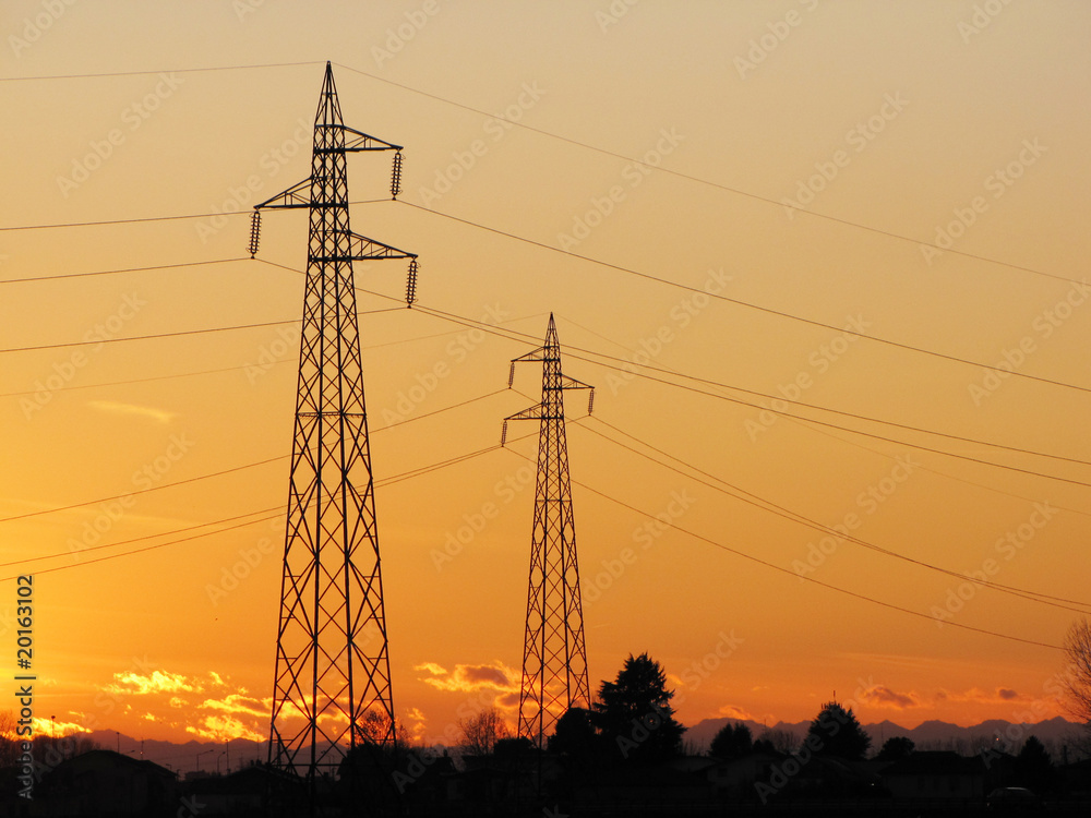 Fototapeta premium electric tower silhouette for during sunset