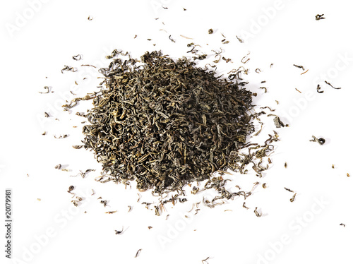 Dry green tea leaves, isolated on a white background