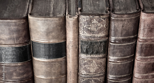 Row of old leather bound books