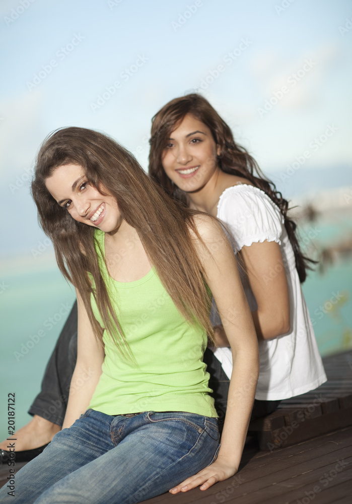 Two young women having fun at the sea Two young women having fun at the sea