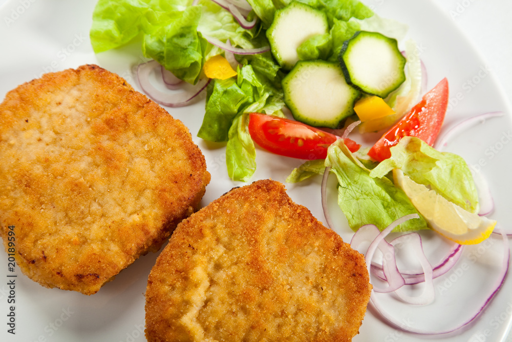 Fried pork chop with vegetables