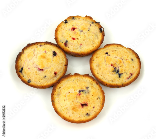 Four blueberry and cranberry muffins