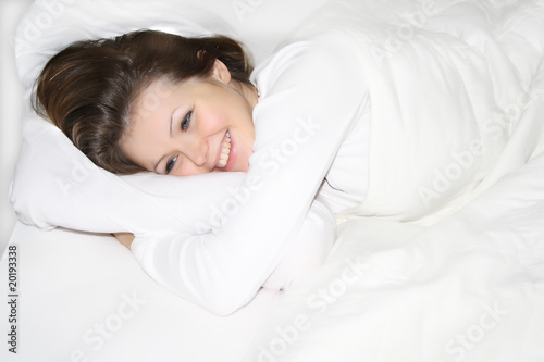 Woman Relaxing on Bed