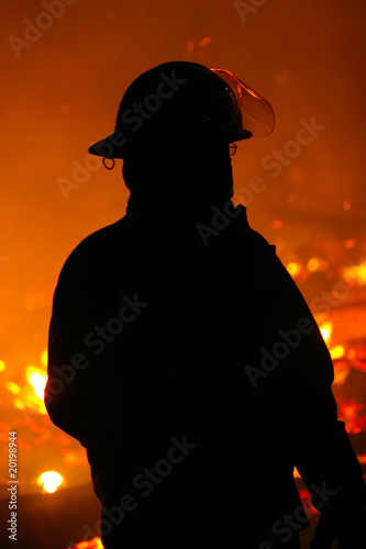 Silhouette of a fire fighter
