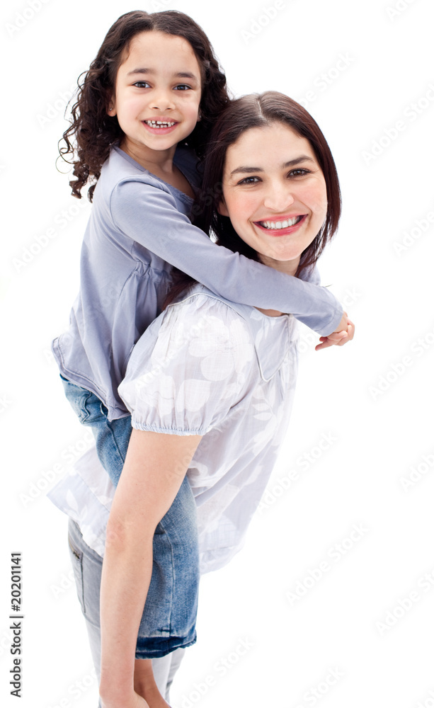 Beautiful mother giving her daughter piggyback ride Beautiful mother giving her daughter piggyback ride