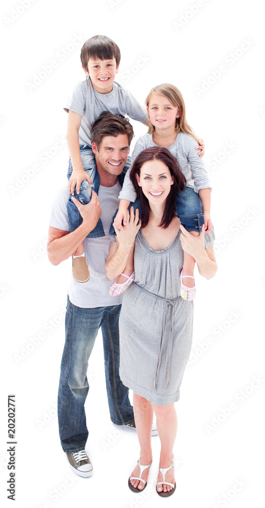 Smiling parents giving their children piggyback ride Smiling parents giving their children piggyback ride