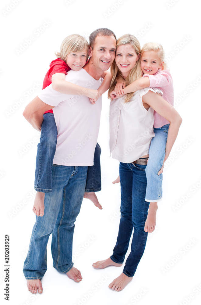 Fototapeta premium Attentive parents giving their children piggyback ride