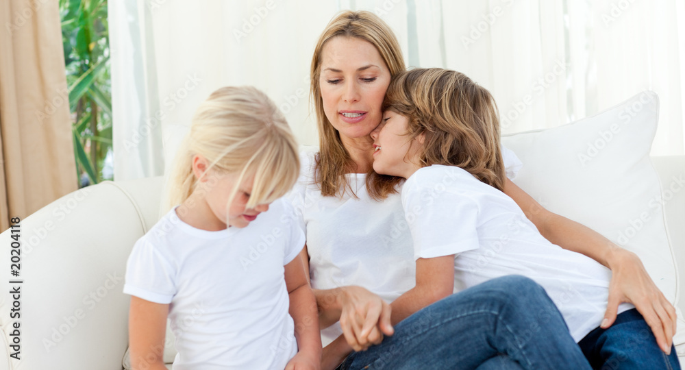 Blond mother having fun with her children