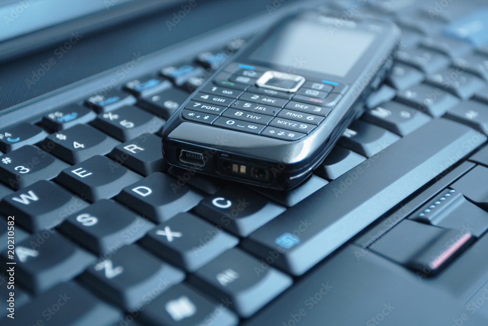 Business concept with cell phone and laptop Business concept with cell phone and laptop