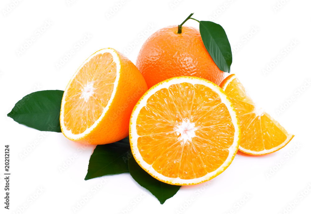 Ripe oranges with green leaves.