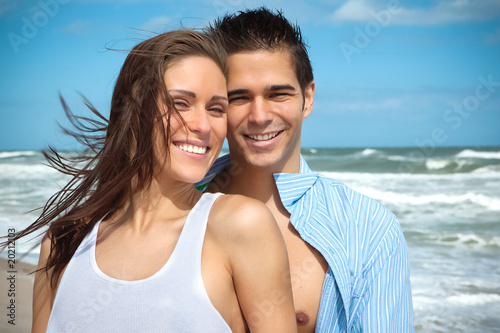 Couple smiling at the beach