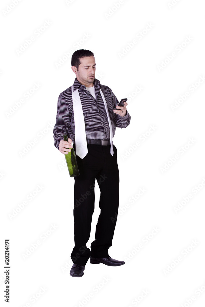 Businessman with a bottle of drink texting Businessman with a bottle of drink texting